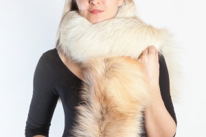 A fur scarf is a universal accessory during the cold season.